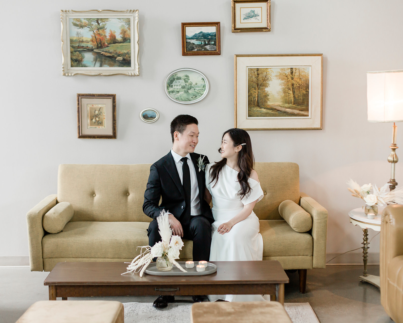 A portrait of a bride and groom at their airbnb laughing and having a great time before eloping in Ontario 