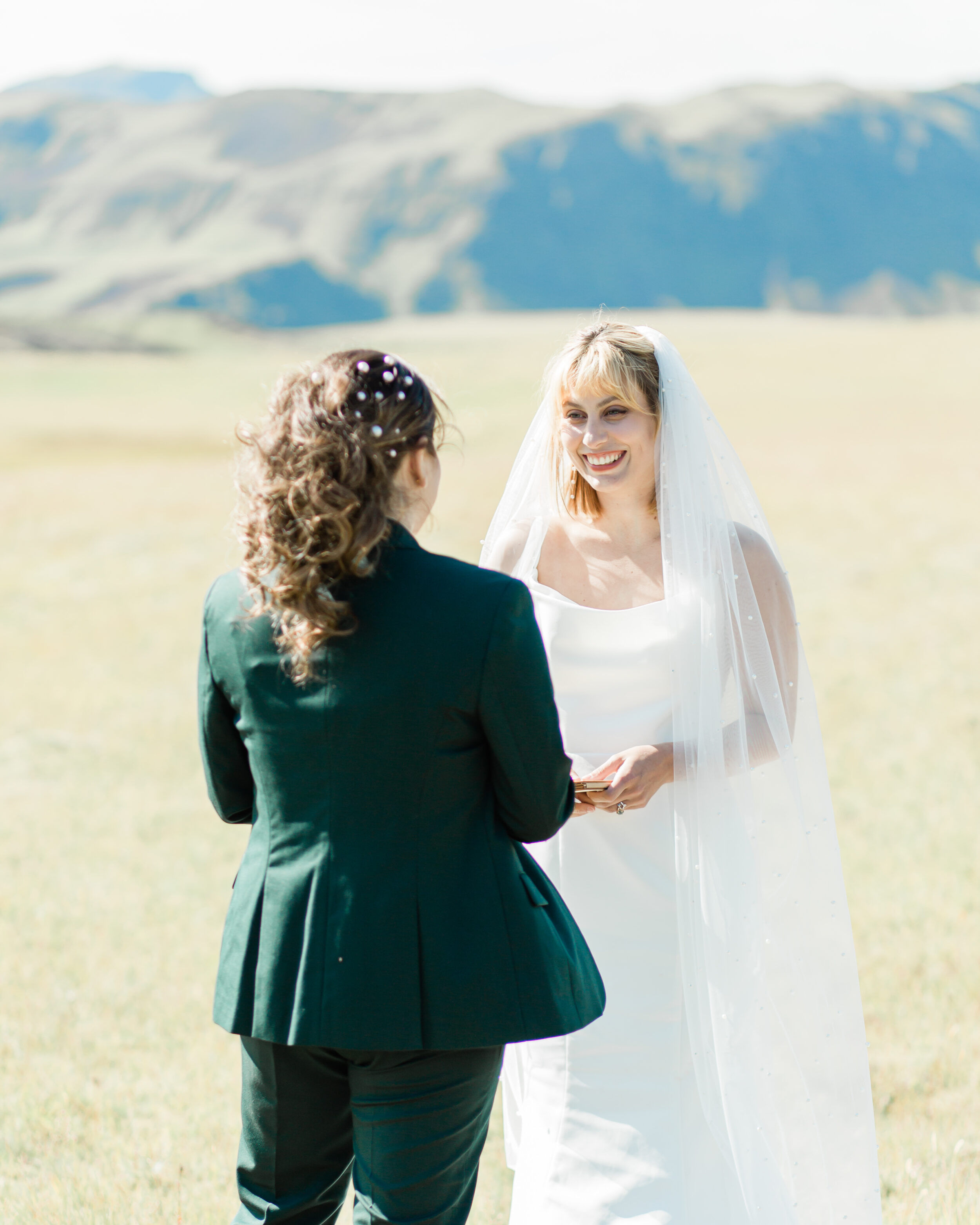 A couple says their Iceland wedding vows during their adventure elopement.