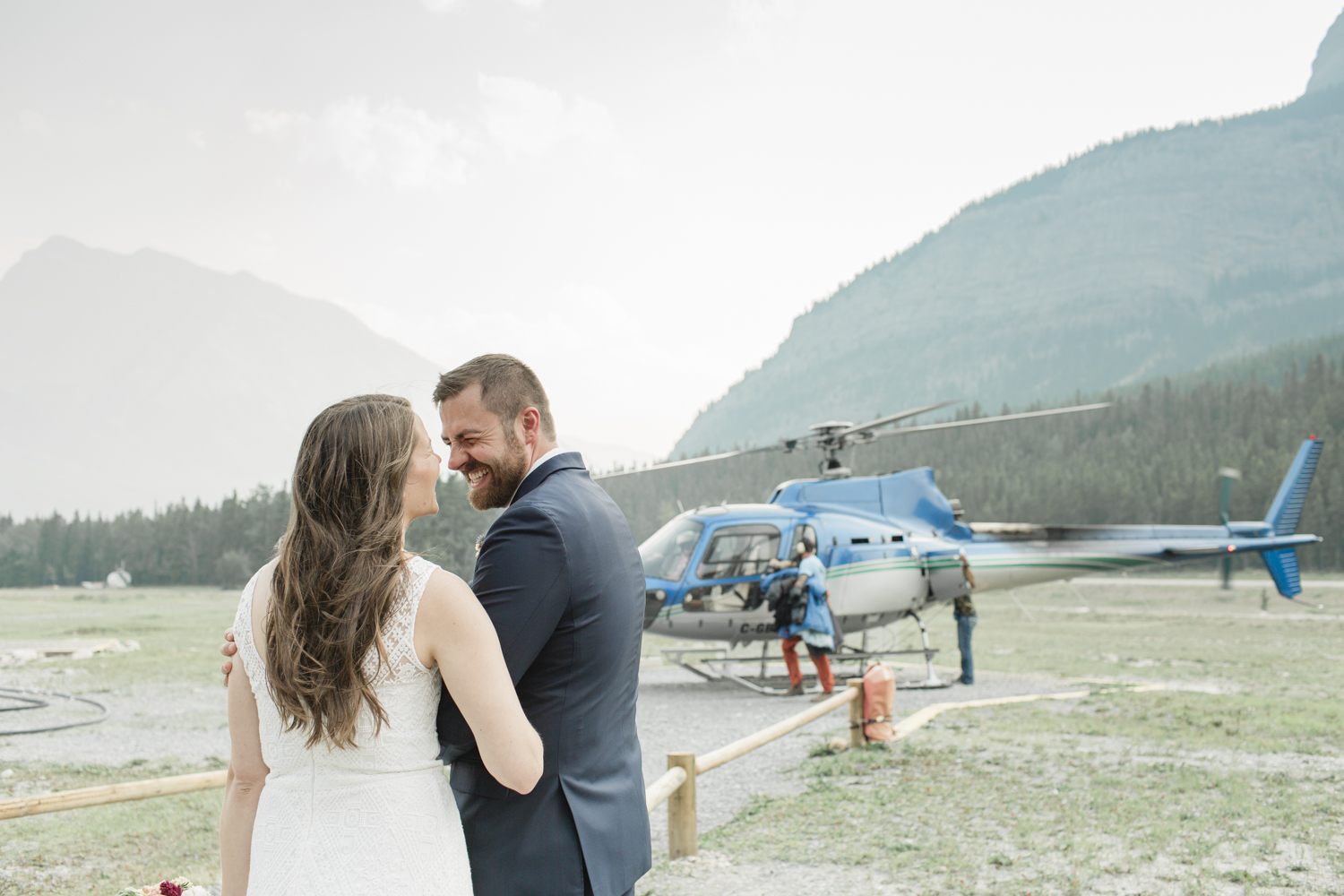 Couple getting ready for their Helicopter Elopement 