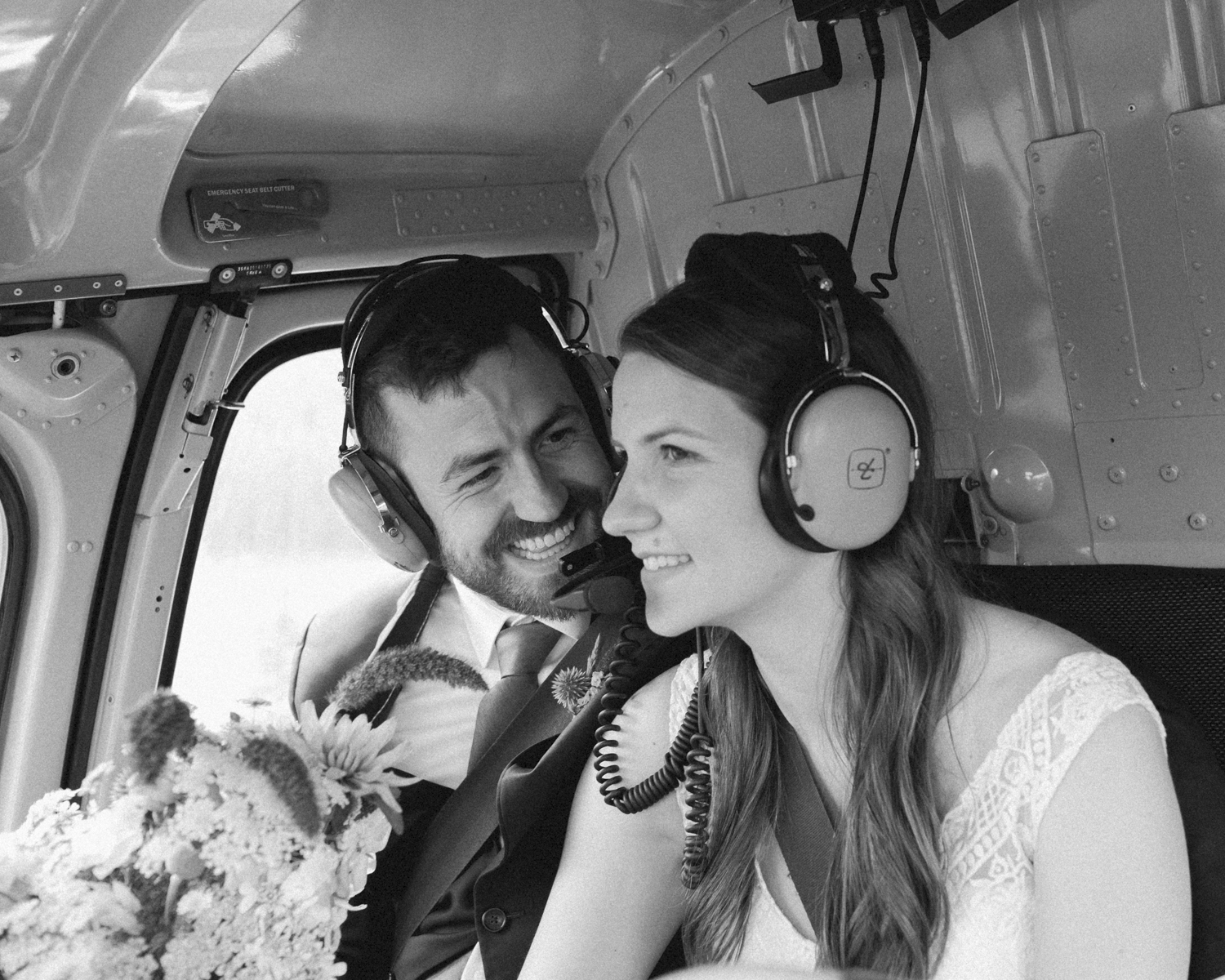 Couple getting ready for their Helicopter Elopement 