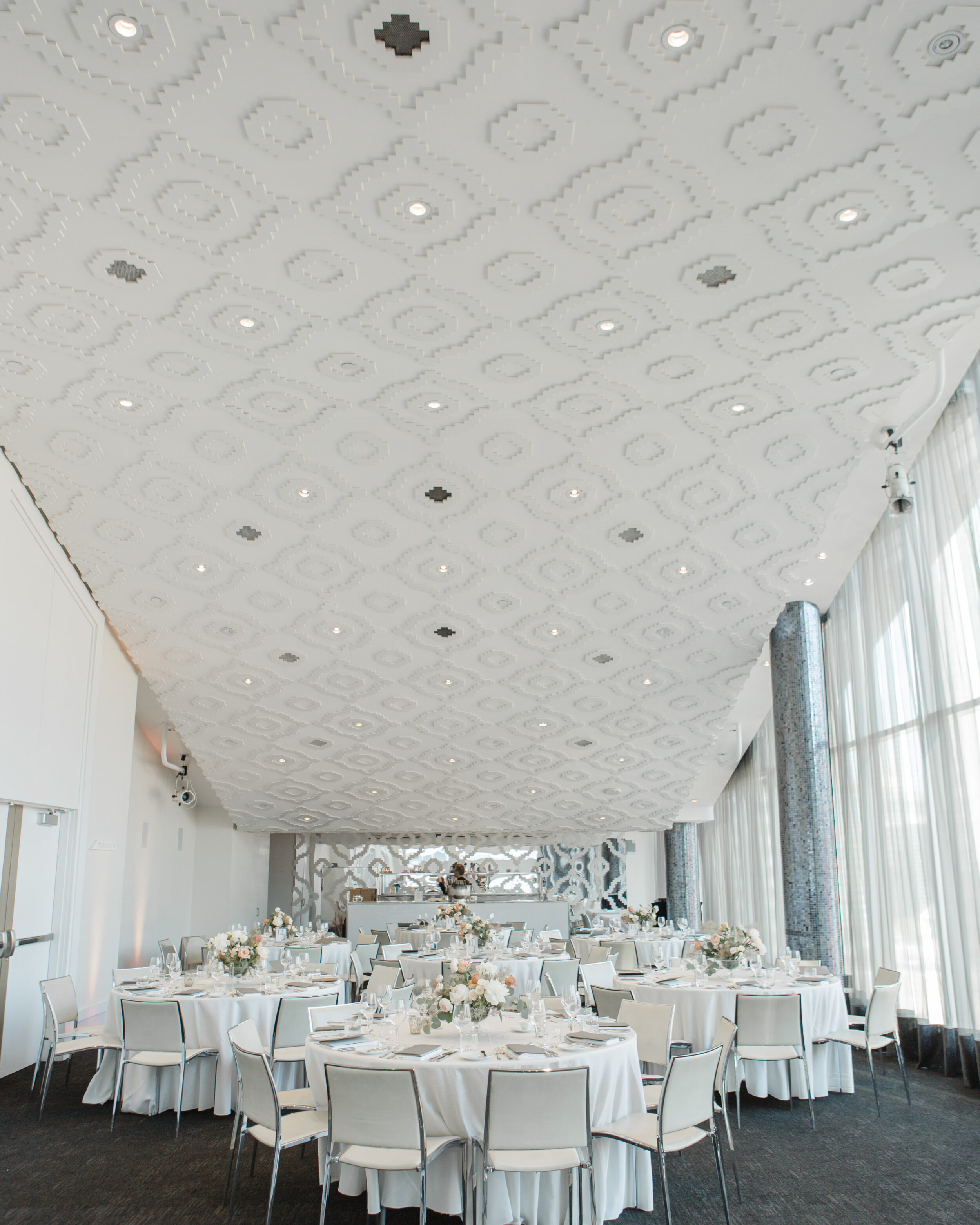 A white and luxurious wedding reception. 