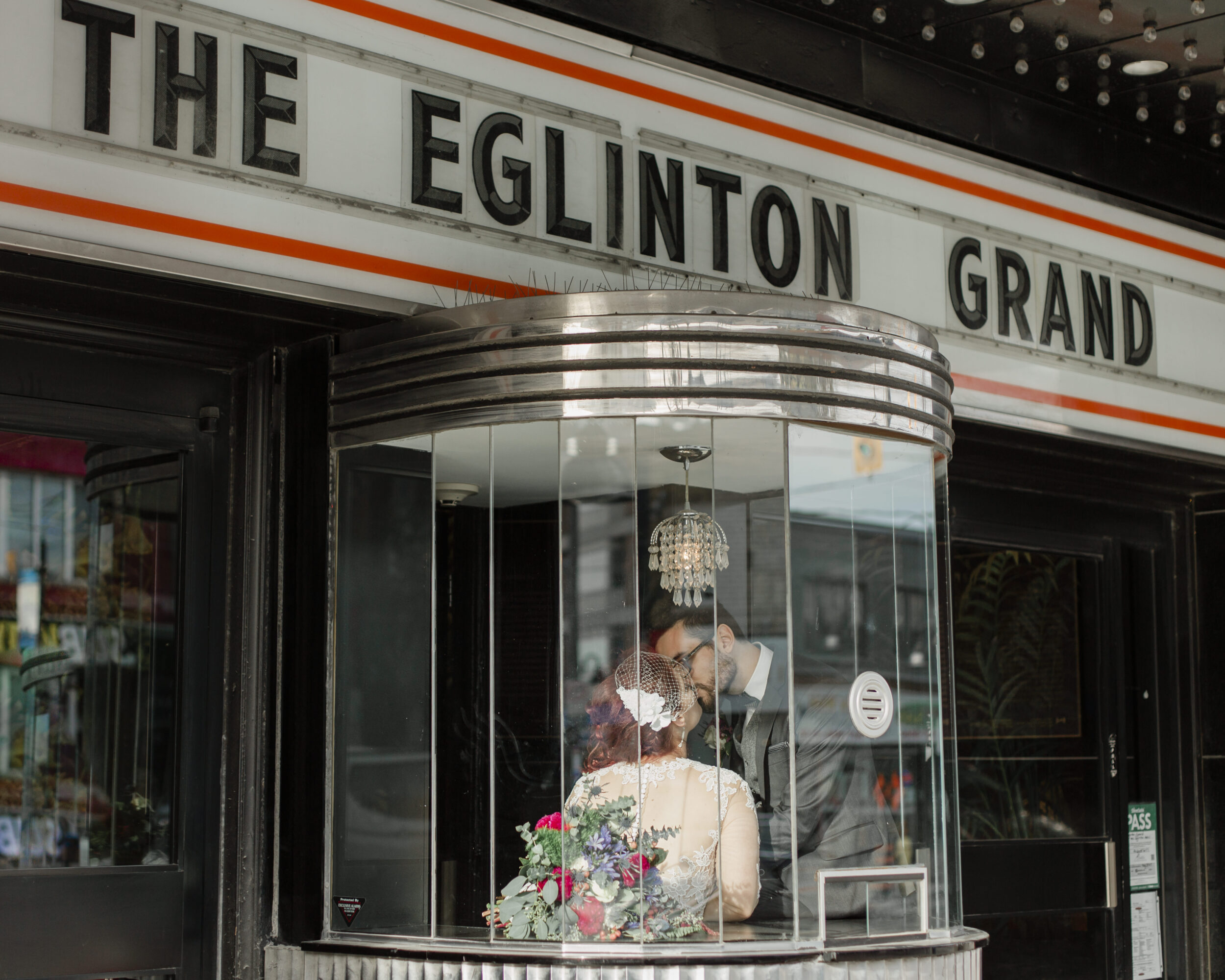 A couple gets married at the Eglinton Grand in Toronto.