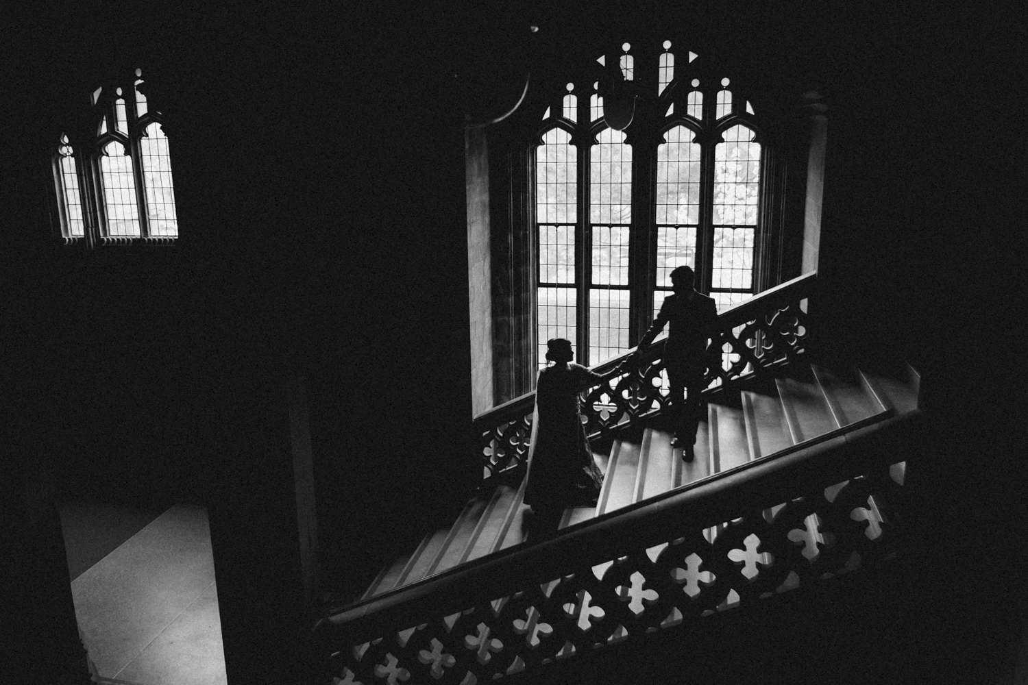 A couple walking up the epic steps at University of Toronto after their elopement ceremony in downtown Toronto