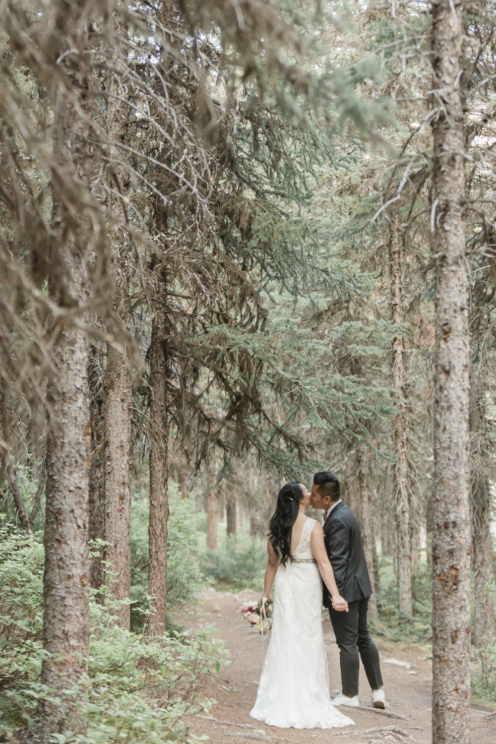 Walking Elopement in Banff National Park in the forest
