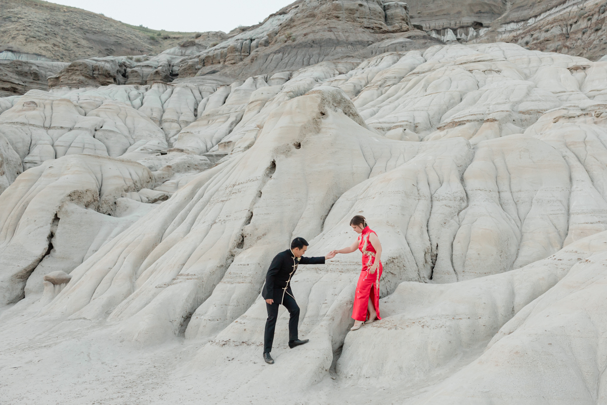 A couple eloping and about to have their first dance along the Hoodoo trail Drumheller Alberta