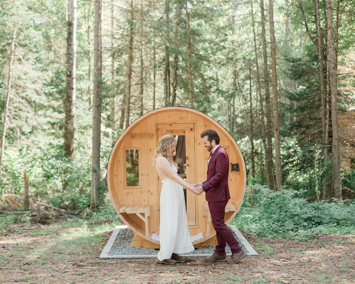 Chelsea and Kevin's first look in front of the sauna at their airbnb in Harcourt Ontario for their elopement day 