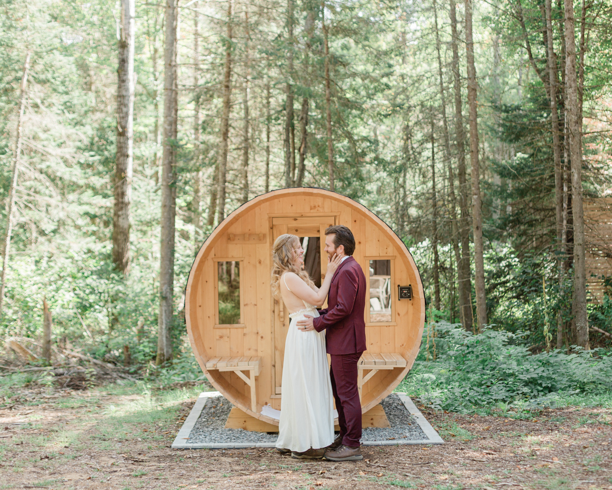 Chelsea and Kevin's first look in front of the sauna at their airbnb in Harcourt Ontario for their elopement day 