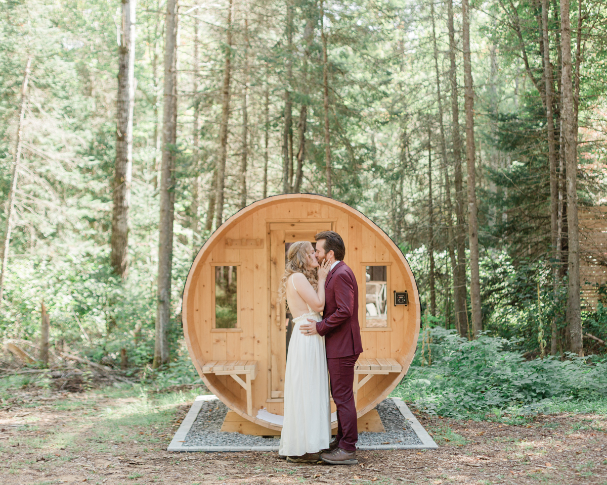 Chelsea and Kevin's first look in front of the sauna at their airbnb in Harcourt Ontario for their elopement day 