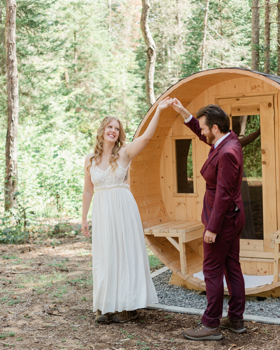 Chelsea and Kevin's first look in front of the sauna at their airbnb in Harcourt Ontario for their elopement day 