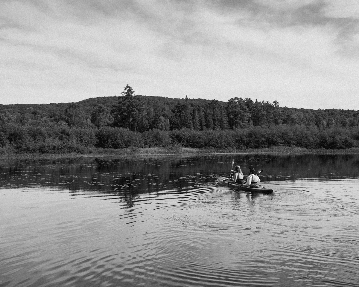 Enjoying a chill kayak ride along the Barron river for their Algonquin Park Elopement 