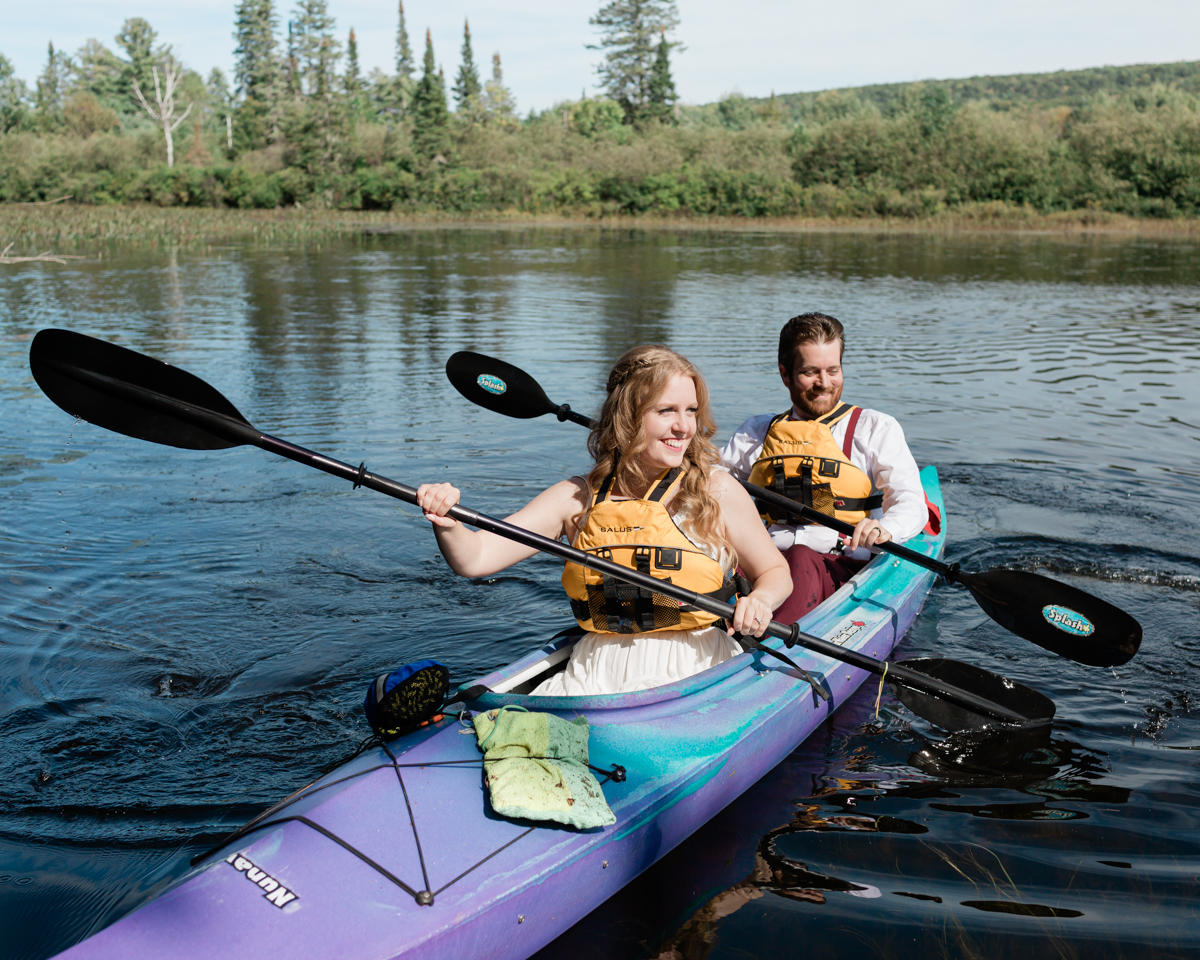 Enjoying a chill kayak ride along the Barron river for their Algonquin Park Elopement 