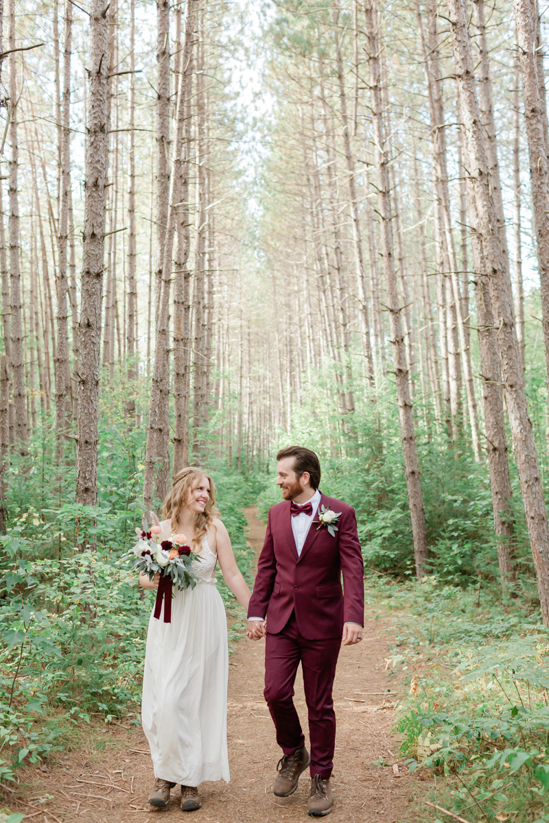 A couple hiking during their Algonquin Park elopement 