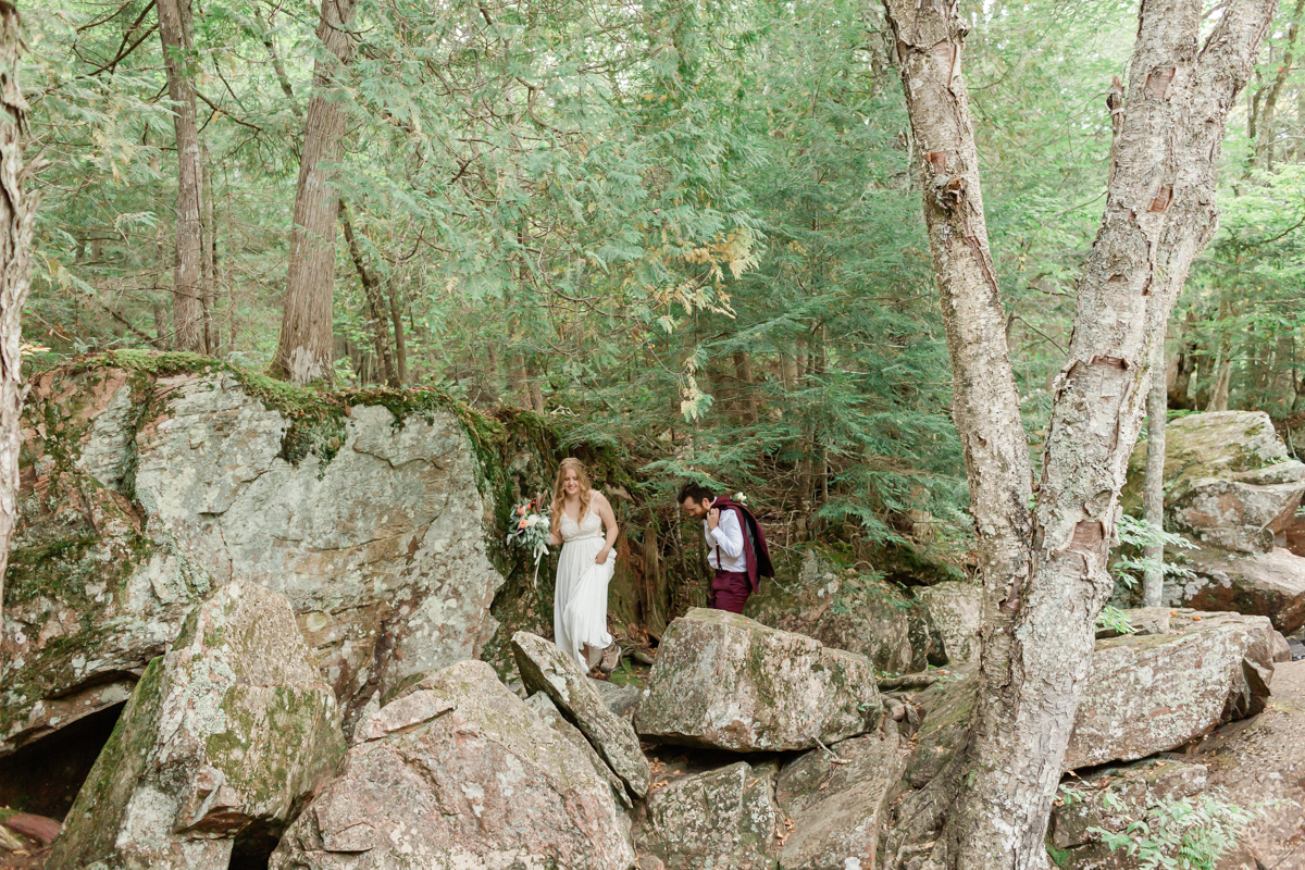 Eating delicious peanut free cupcakes in front of a super cool mystical tree during their Algonquin Park elopement