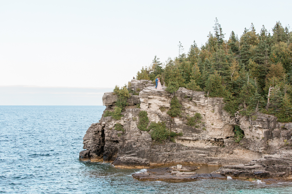 A couple exchanging vows in Bruce Peninsula National Park during their wedding day 