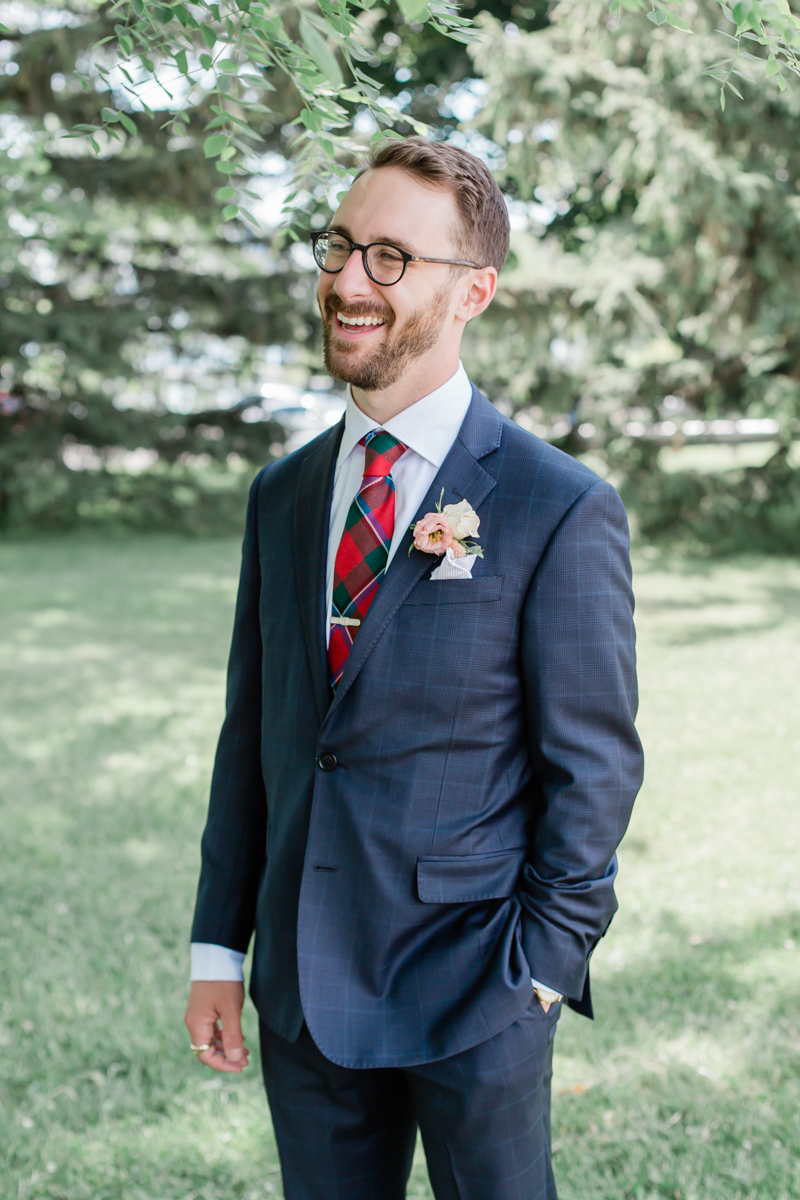 Caileigh & Garret's wedding groom portraits on Lake Ontario at the Henley Room