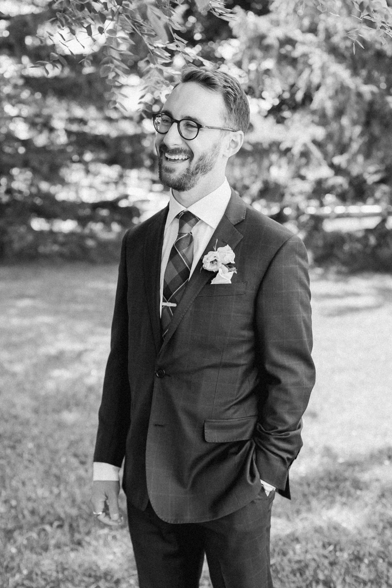 Caileigh & Garret's wedding groom portraits on Lake Ontario at the Henley Room