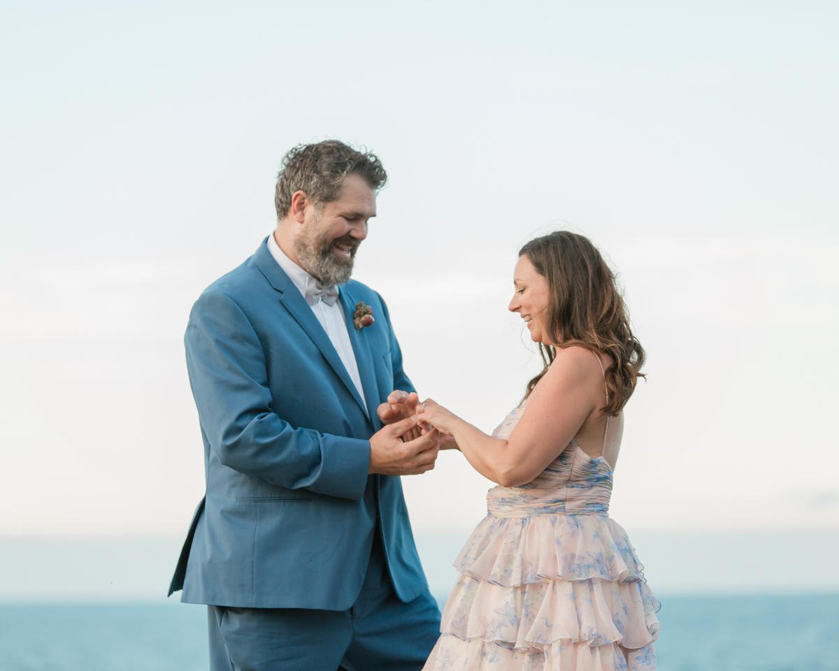 Katie and John during their ceremony where they said vows and exchanged rings near the Grotto and Indian Head Cove for their Ontario elopement
