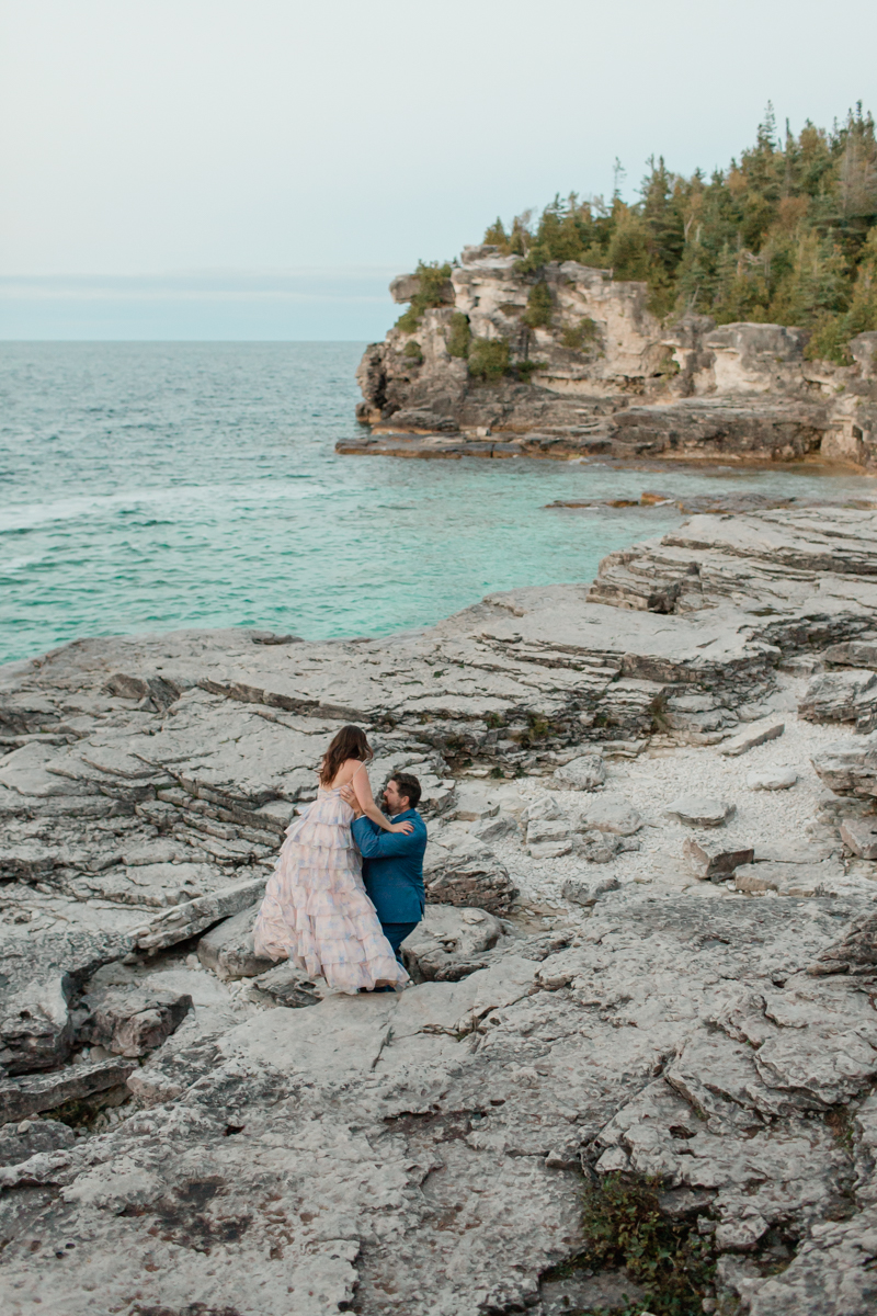 Katie and John take lantern wedding portraits near the Grotto and Indian Head Cove in Ontario 