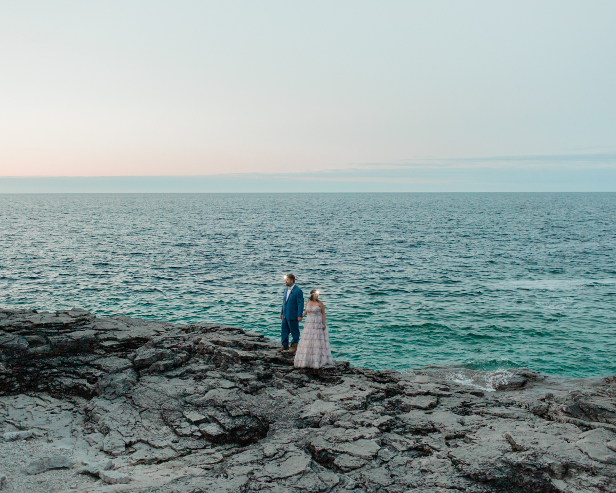 Katie and John take headlamp wedding portraits near the Grotto and Indian Head Cove in Ontario 