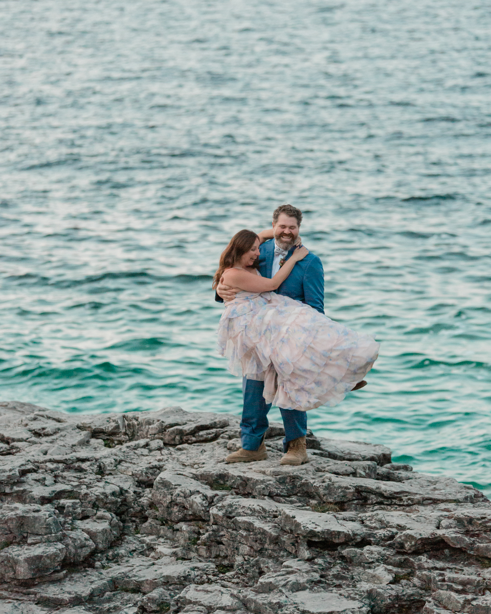 Katie and John take lantern wedding portraits near the Grotto and Indian Head Cove in Ontario 