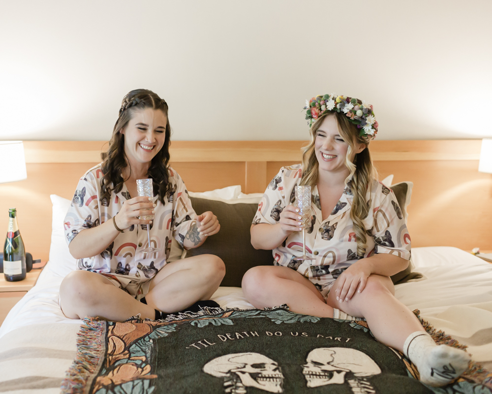 Lauren and Amber have a serenade dance party at their Moraine Lake Lodge accommodation for their Banff National Park Elopement