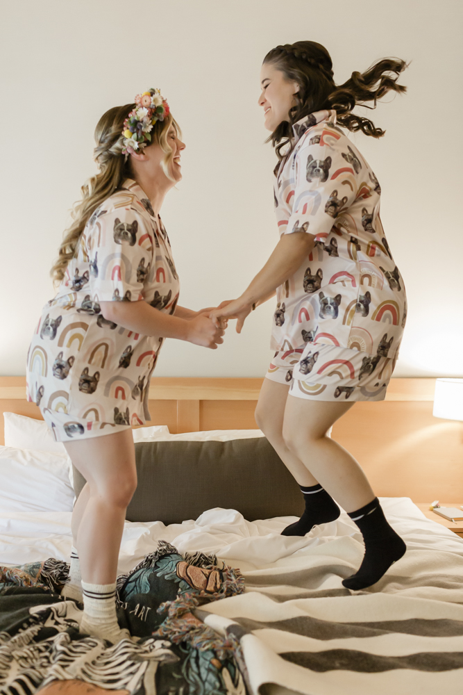 Lauren and Amber have a serenade dance party at their Moraine Lake Lodge accommodation for their Banff National Park Elopement