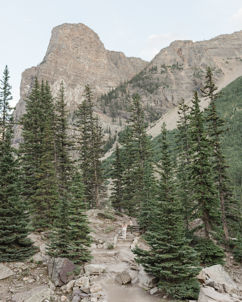 A couple overlooking Moraine Lake for their LGBTQ+ Banff elopement