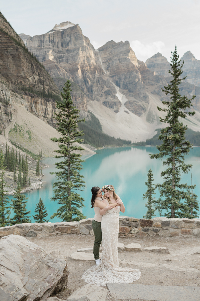 A couple overlooking Moraine Lake for their LGBTQ+ Banff elopement