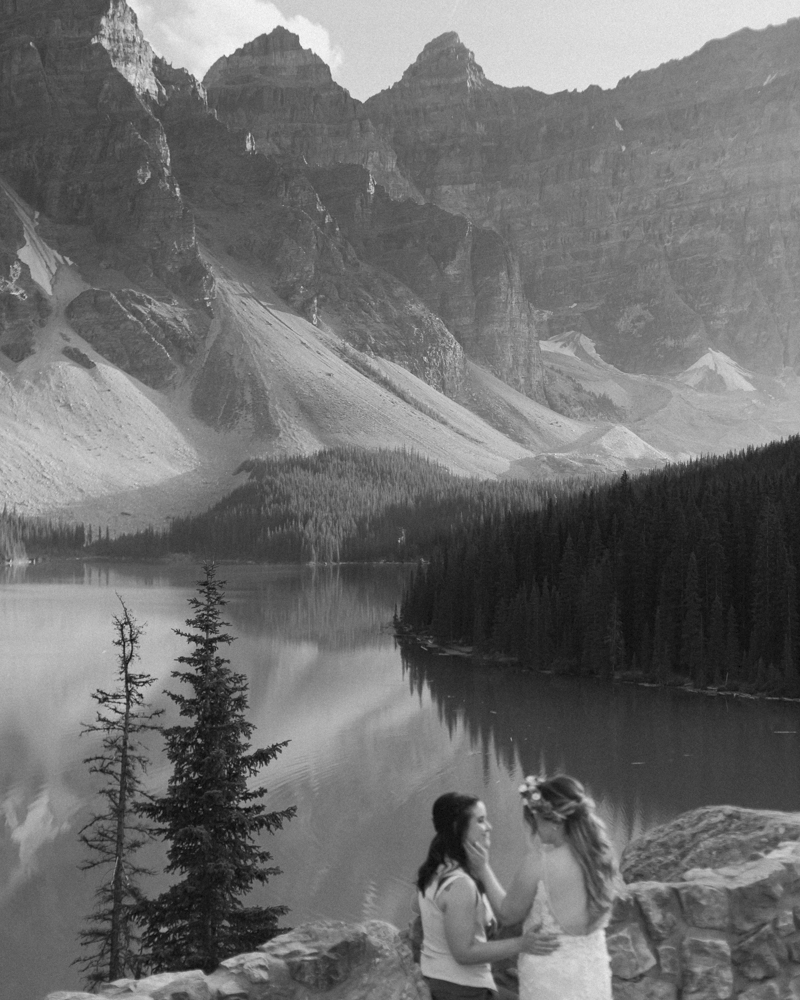 A couple overlooking Moraine Lake for their LGBTQ+ Banff elopement