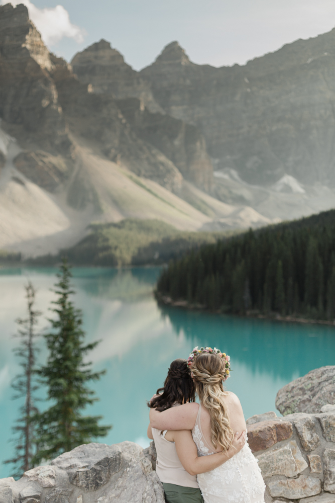 A couple overlooking Moraine Lake for their LGBTQ+ Banff elopement