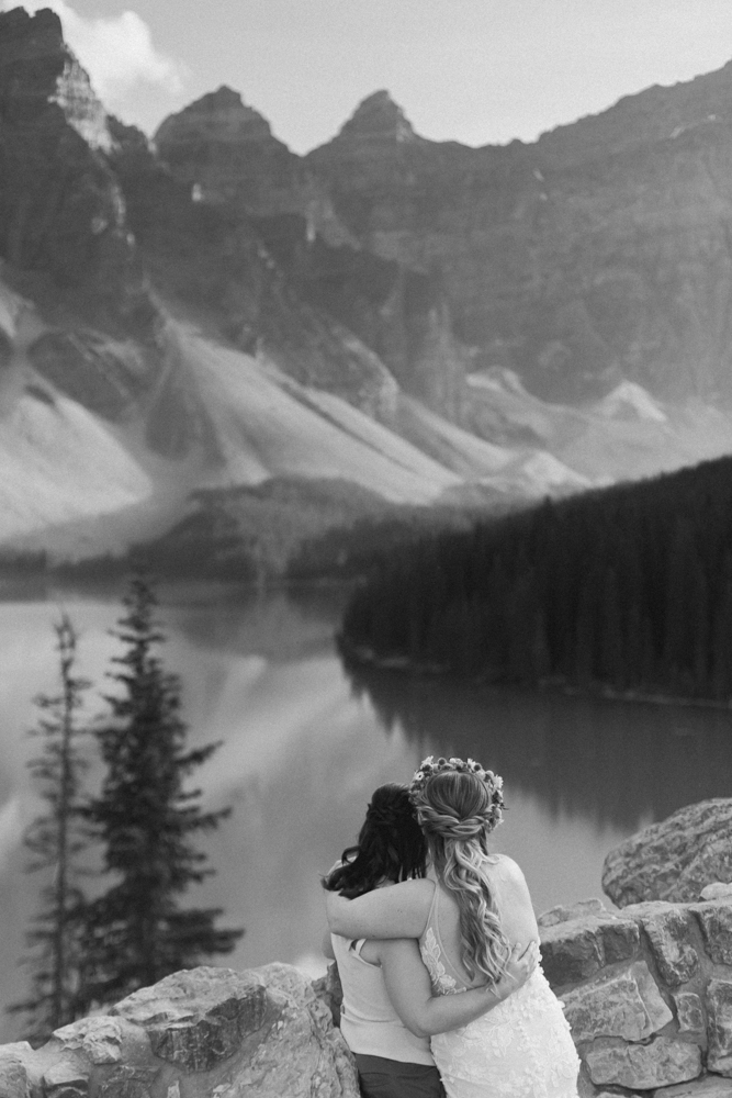 A couple overlooking Moraine Lake for their LGBTQ+ Banff elopement