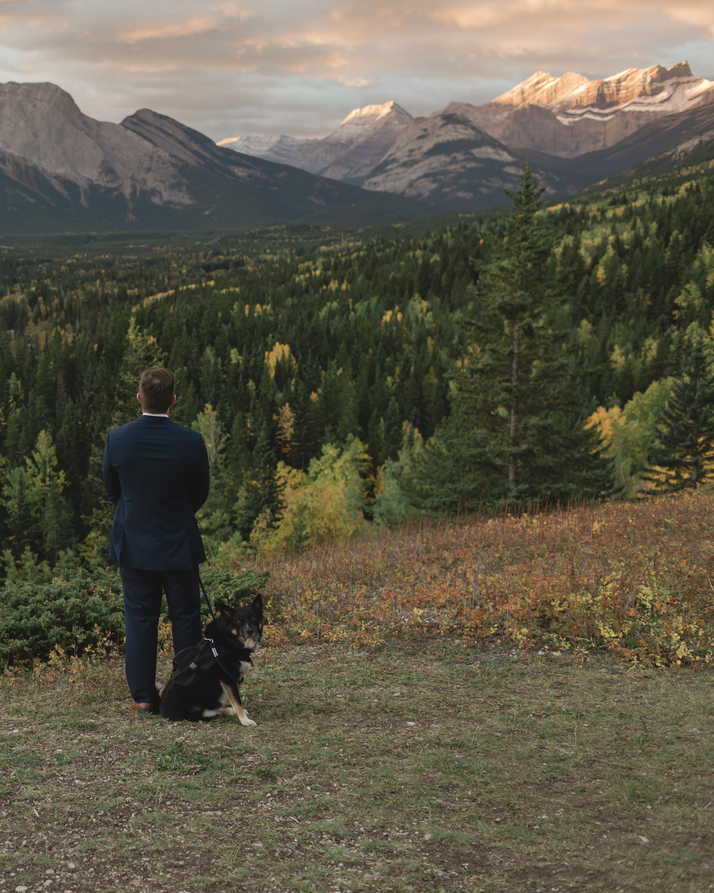 A couple having their first look at Kananaskis Mountain Lodge at sunrise