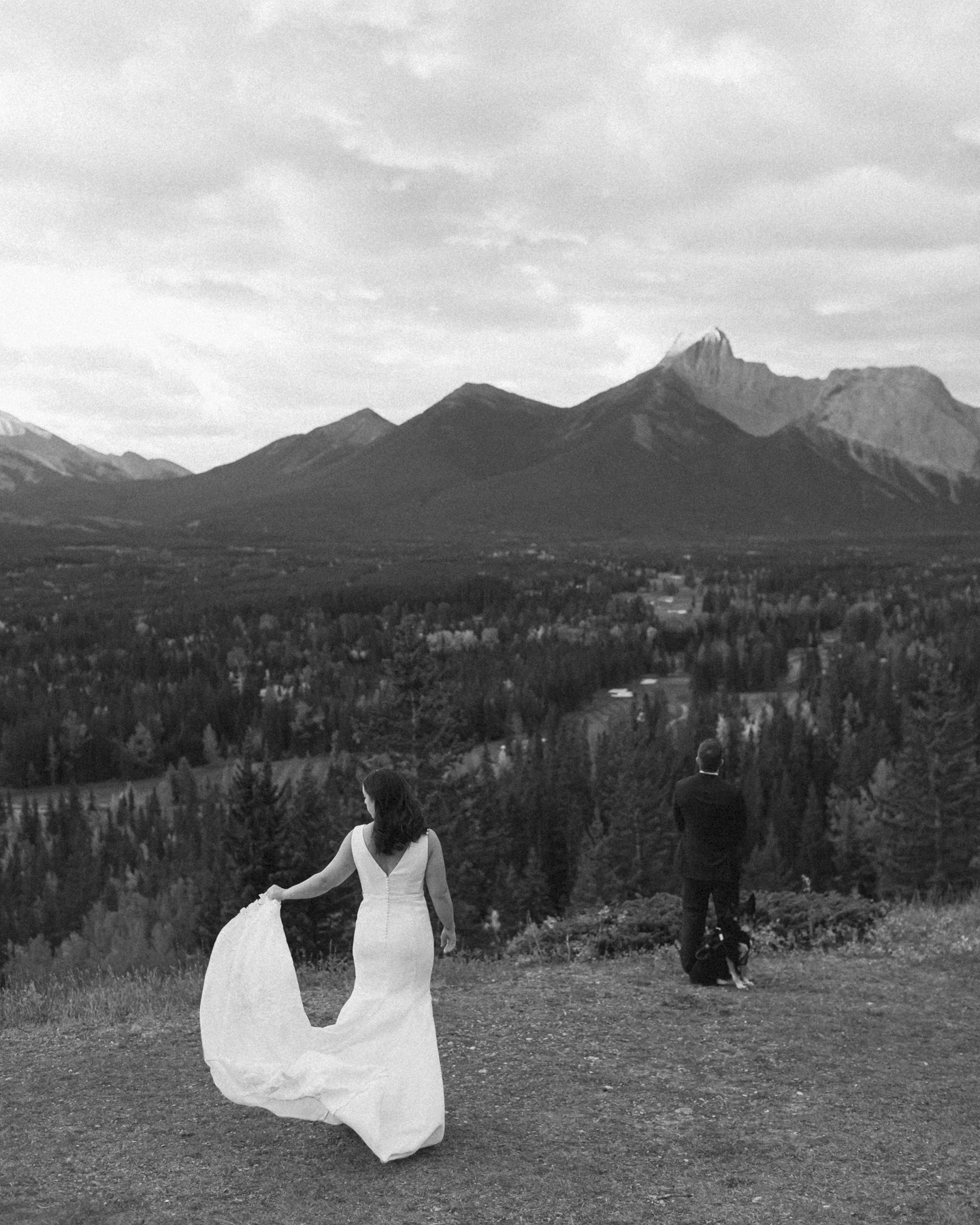 A couple having their first look at Kananaskis Mountain Lodge at sunrise