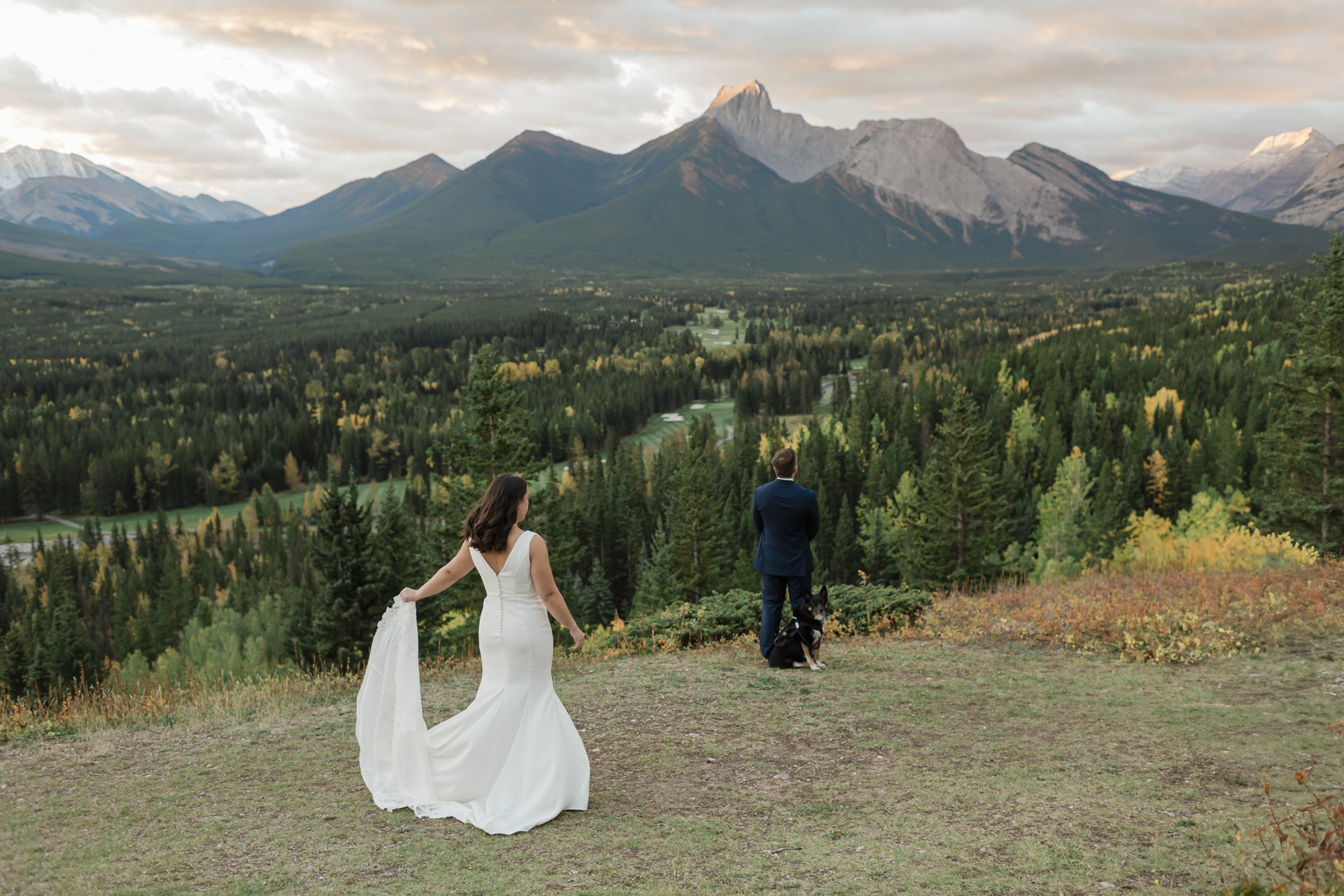 A couple having their first look at Kananaskis Mountain Lodge at sunrise