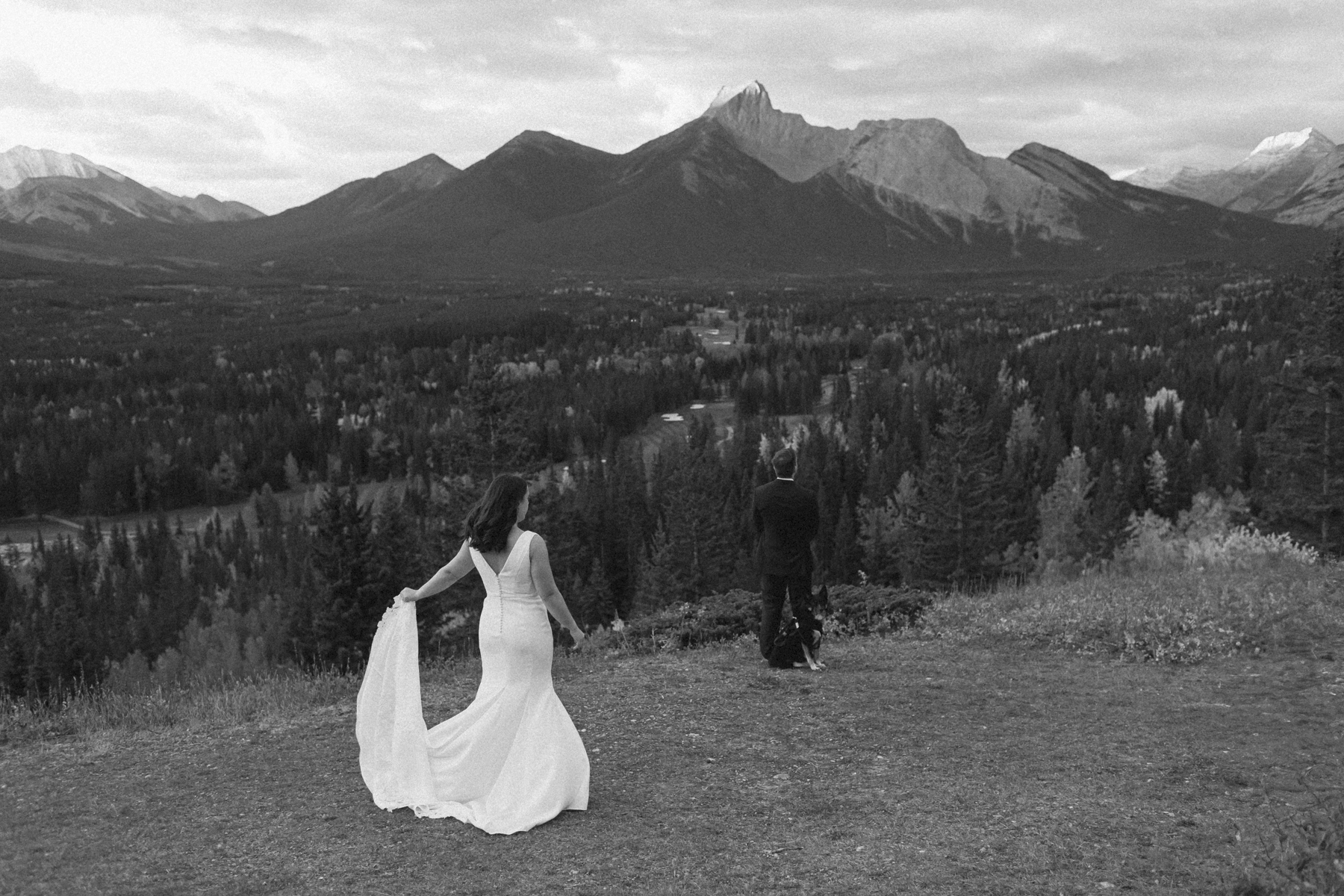 A couple having their first look at Kananaskis Mountain Lodge at sunrise