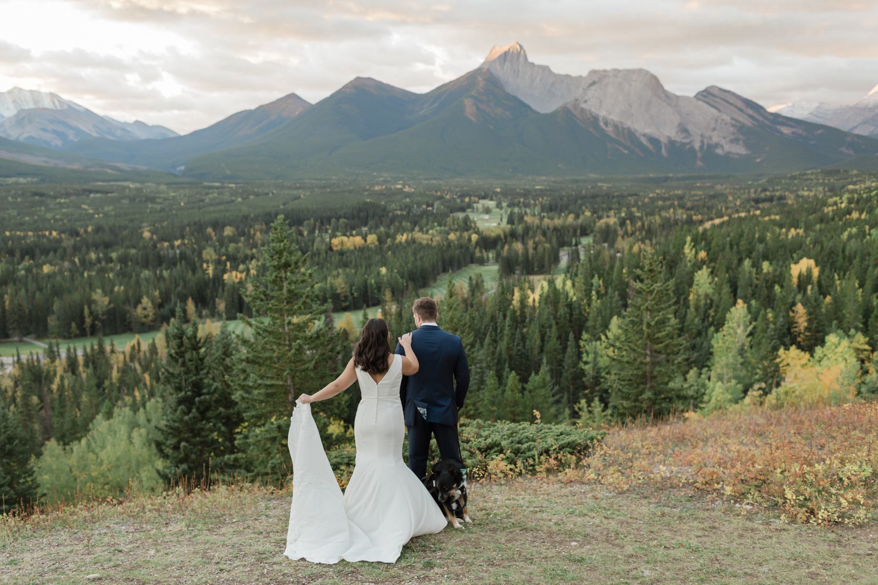 A couple having their first look at Kananaskis Mountain Lodge at sunrise