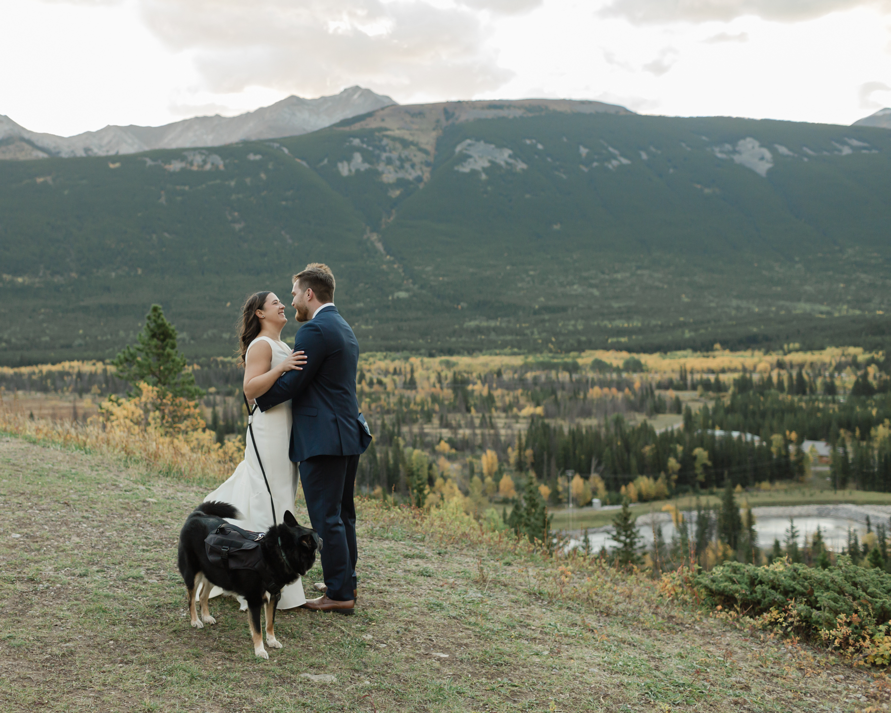 A couple having their first look at Kananaskis Mountain Lodge at sunrise