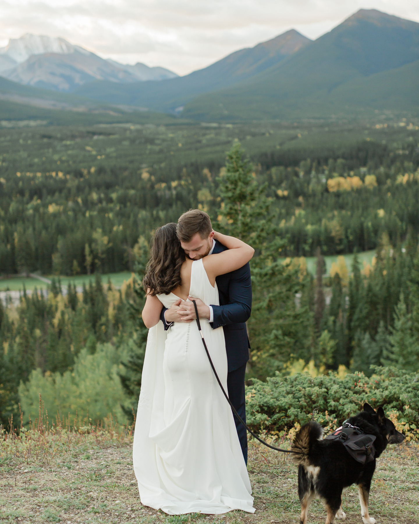 A couple having their first look at Kananaskis Mountain Lodge at sunrise