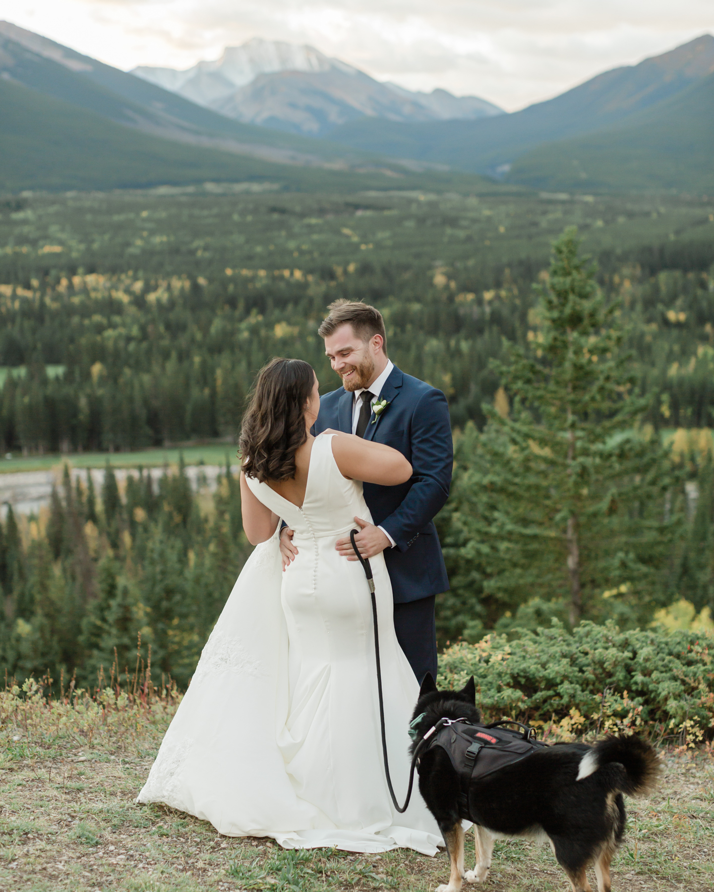 A couple having their first look at Kananaskis Mountain Lodge at sunrise