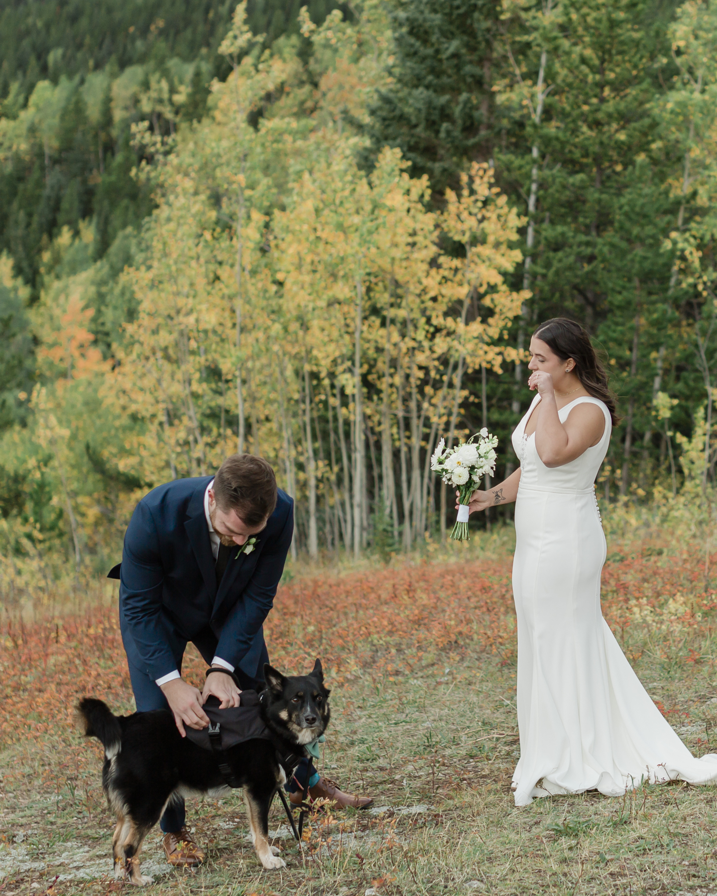 A couple exchanging vows and rings during their Kananaskis Country ceremony