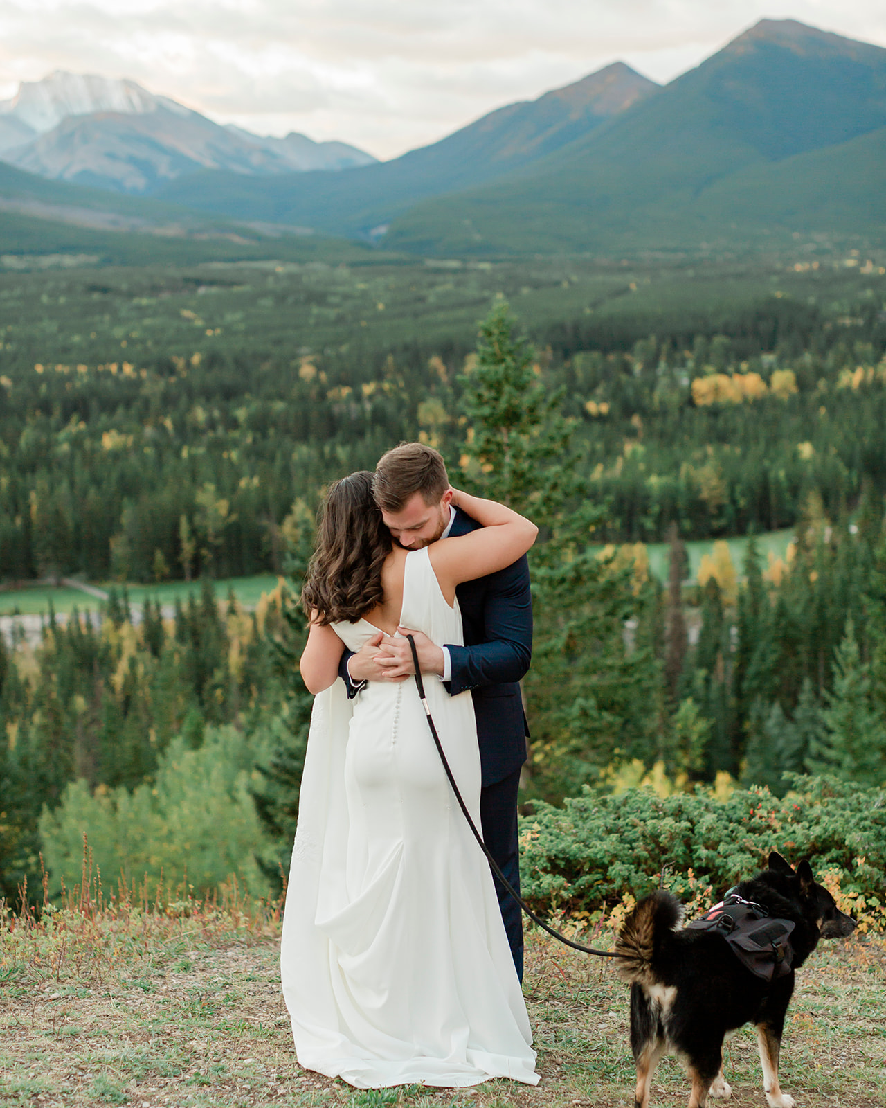 Couple hugging in Kananaskis Country during their banff elopement