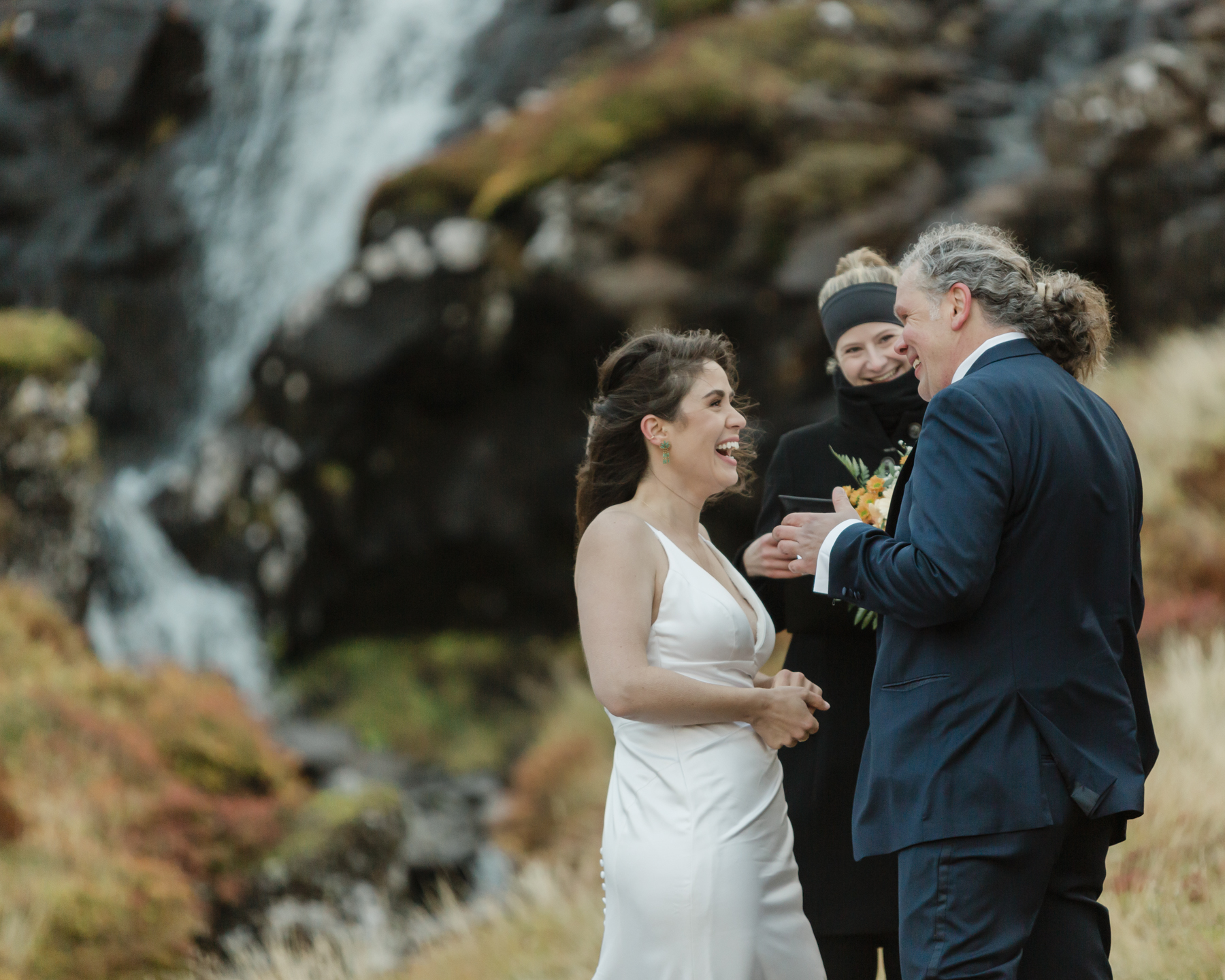 A couple eloping near a secluded waterfall in Iceland