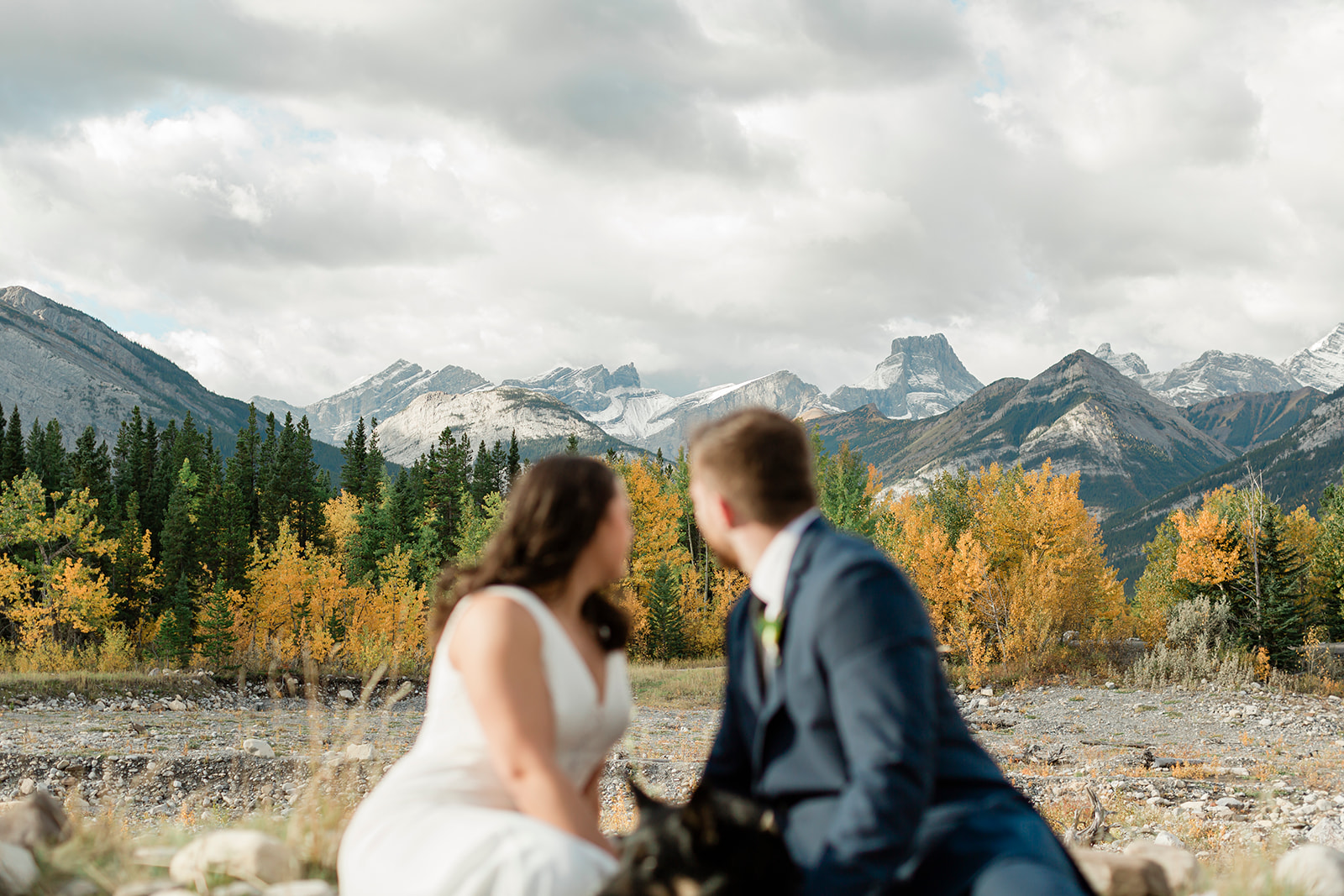 Couple looking at the mountains in Kananaskis Country during their banff elopement