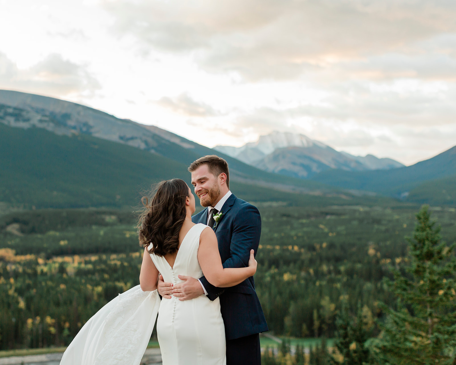 Couple hugging in Kananaskis Country during their banff elopement