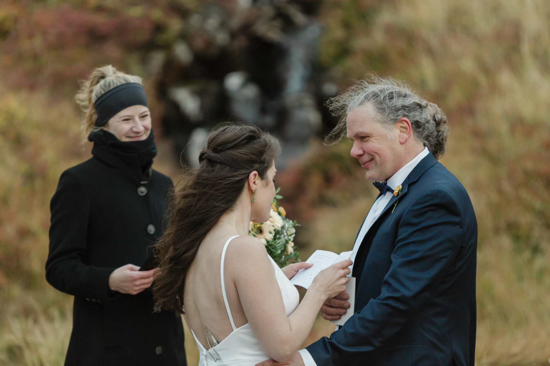 A couple eloping near a secluded waterfall in Iceland