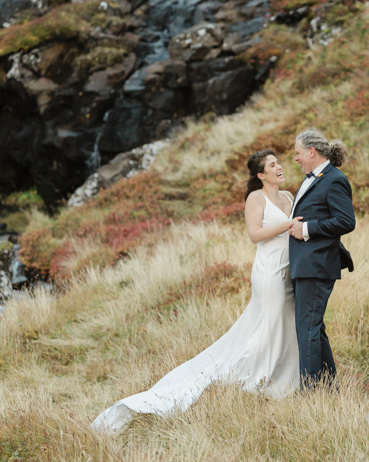 A couple eloping near a secluded waterfall in Iceland