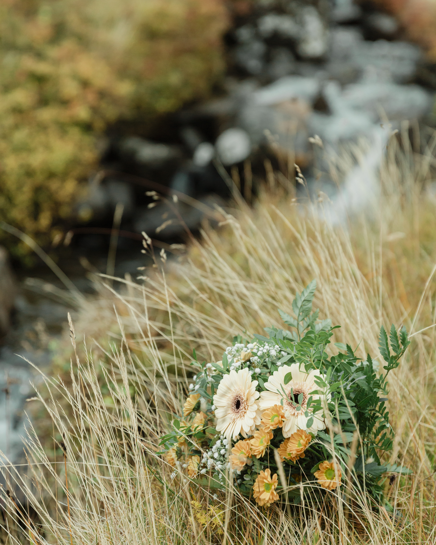 A wedding bouquet in the grass in autumn in Iceland