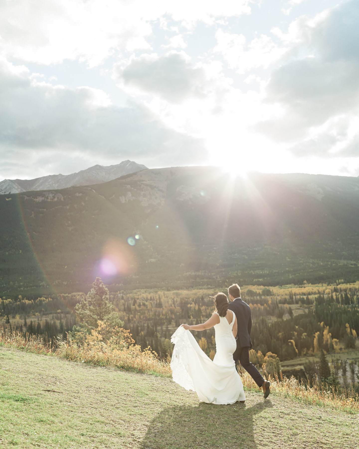 A couple walking during their Kananaskis Country ceremony