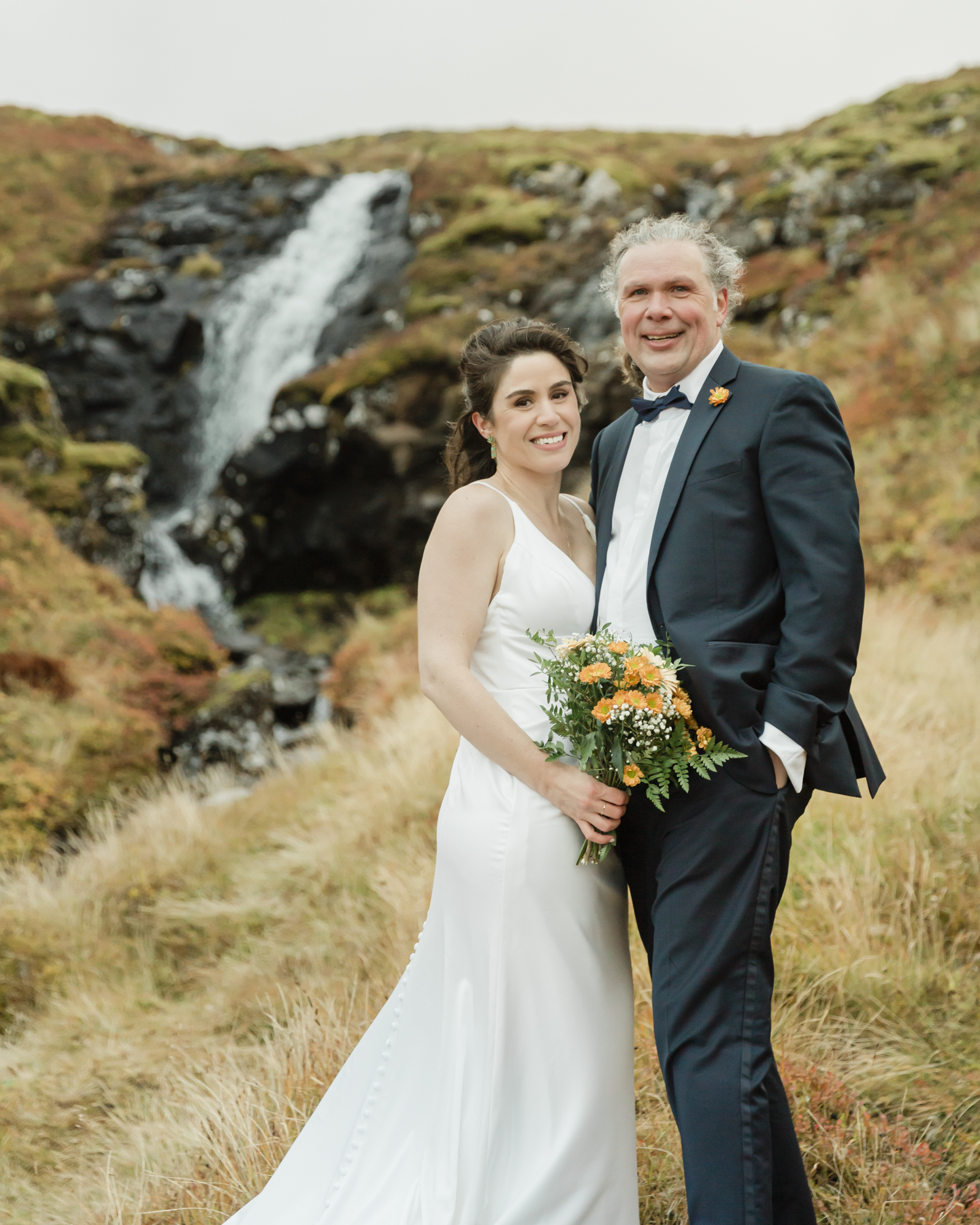 A couple posing for a photo during their Iceland wedding on the Snæfellsnes Peninsula 