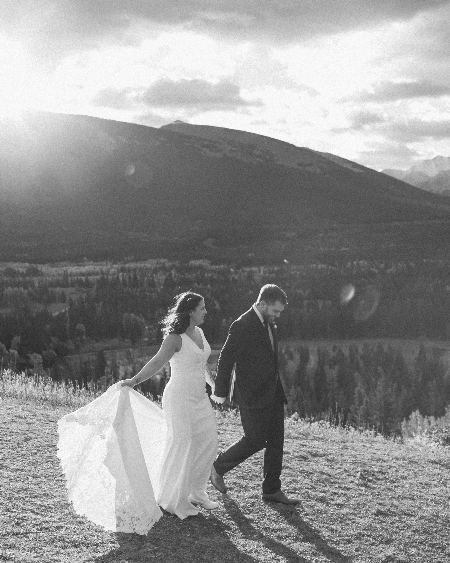 A couple walking during their Kananaskis Country ceremony